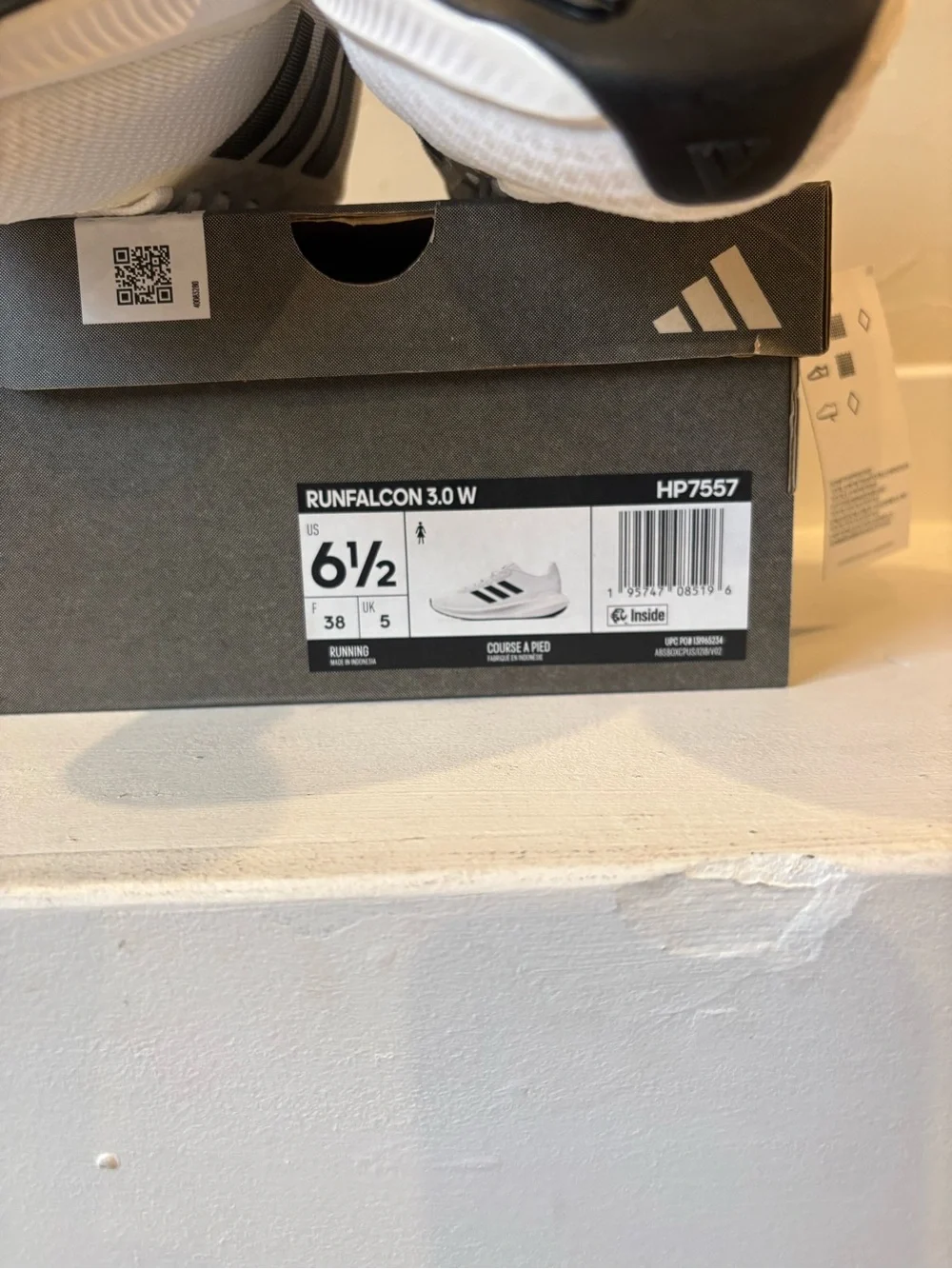 Adidas Women’s White Sneakers with Black Stripes
